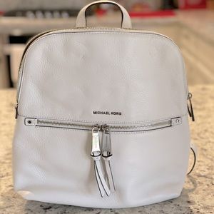 Michael Kors soft leather, white, midsize crossbody backpack.